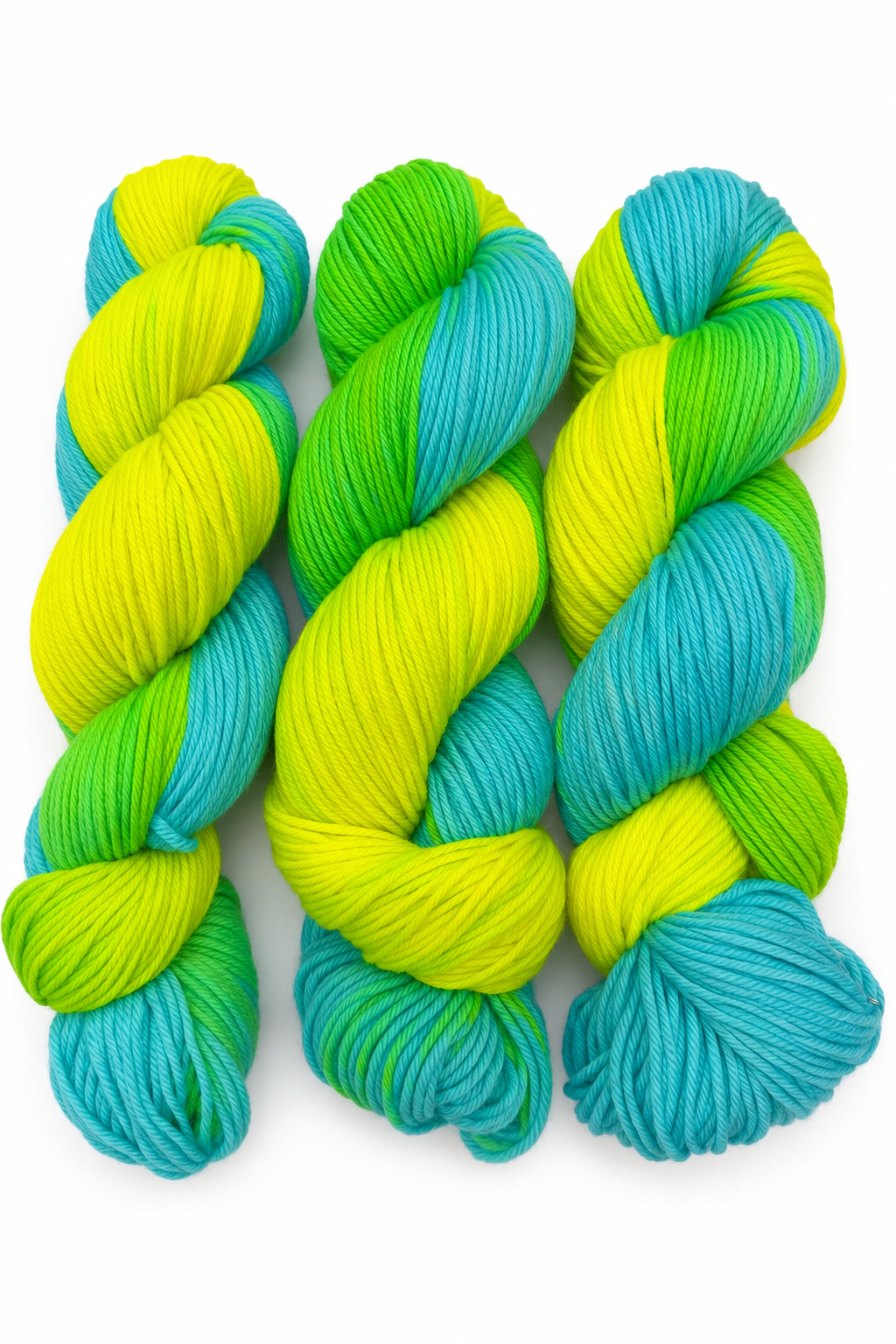 Lime Wire hand-dyed DK weight yarn in hot pink, red, and electric green